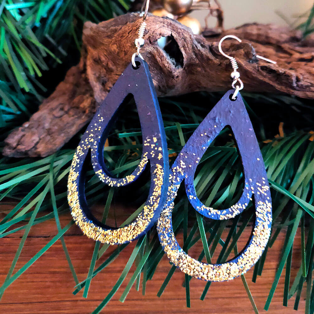 Double blue drop earrings with gold glitter.
