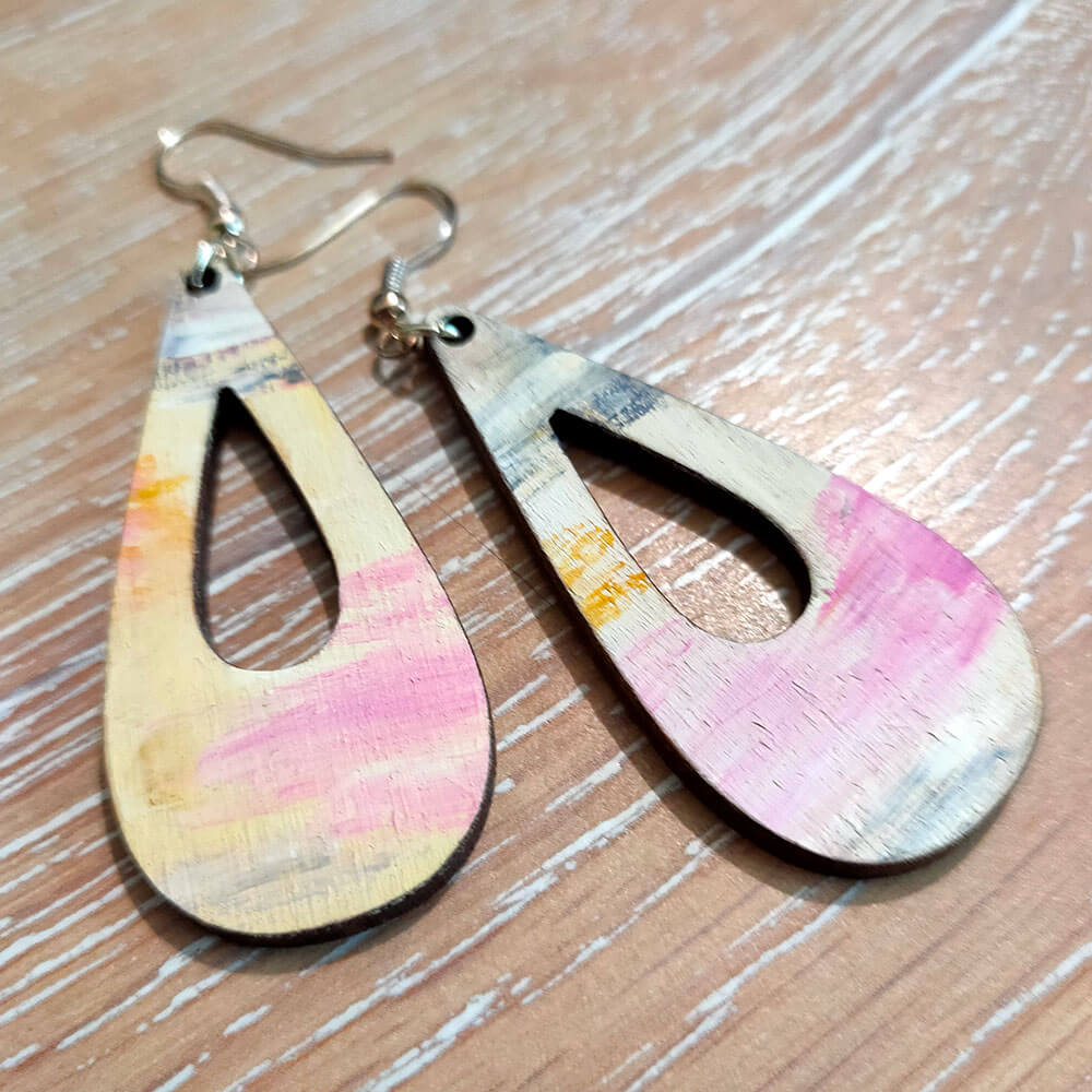 Pink, blue and cream brushstroke earrings with silver coloured hooks.